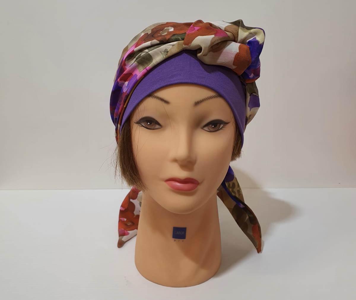 Parrucche Perugia turbante viola foulard floreale